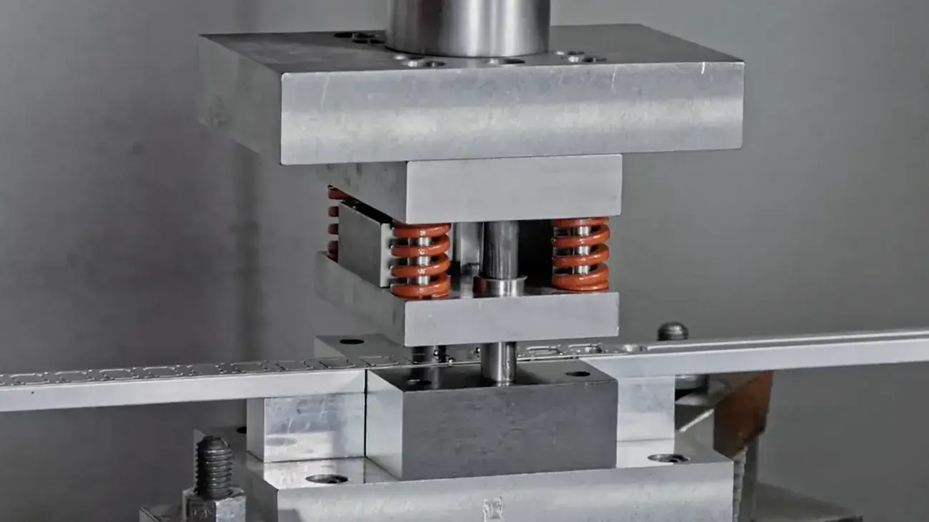 Custom photo-etched and manually formed metal EMI shielding components.